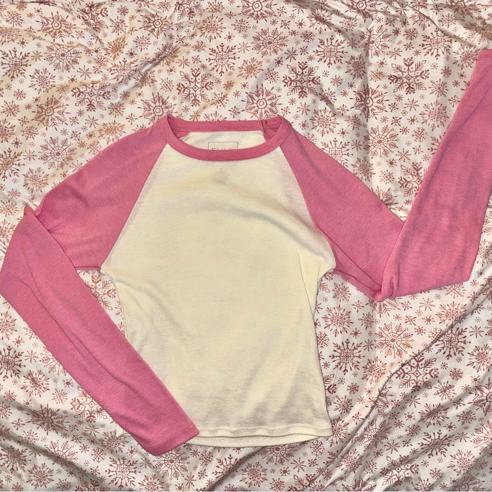 Never worn before long sleeve top.